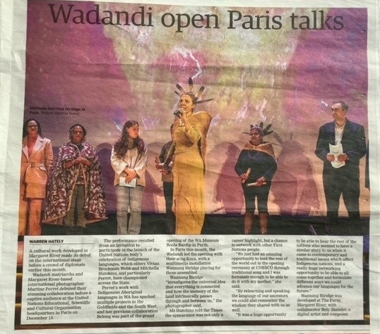 A photo of a newspaper page. The headline reads 'Wadandi open Paris talks' above a large photo of people on stage and text underneath