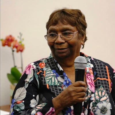 A woman holding a microphone