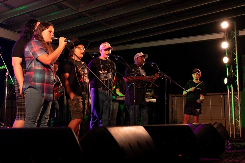 A group of students perform during a music bootcamp