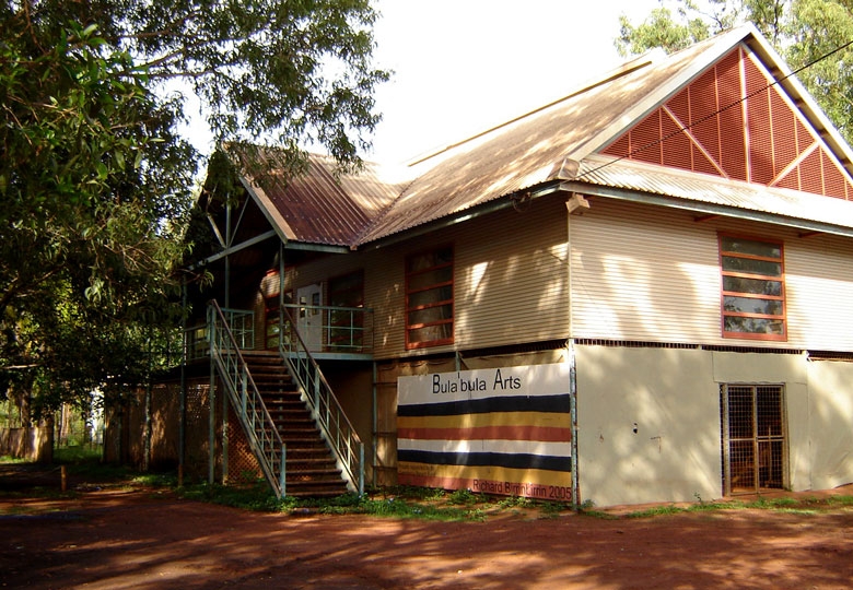 A house with a tree next to it