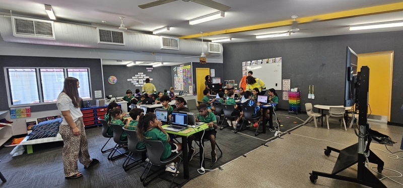 A classroom of children with computers