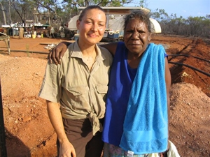 Two women smile at the camera