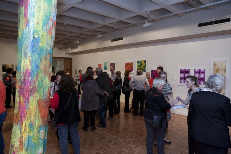 A group of people in an art gallery