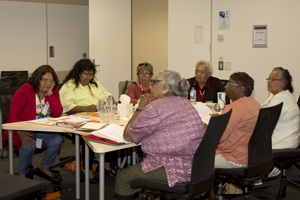 A group of people sitting at a table