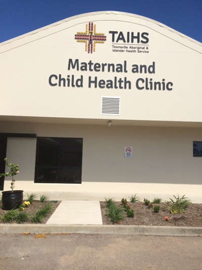 The front of a building with the words Maternal and child health clinic on it